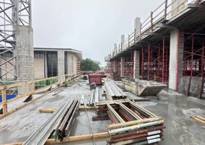 Standing outside the future cafe looking down the hallway toward the church.