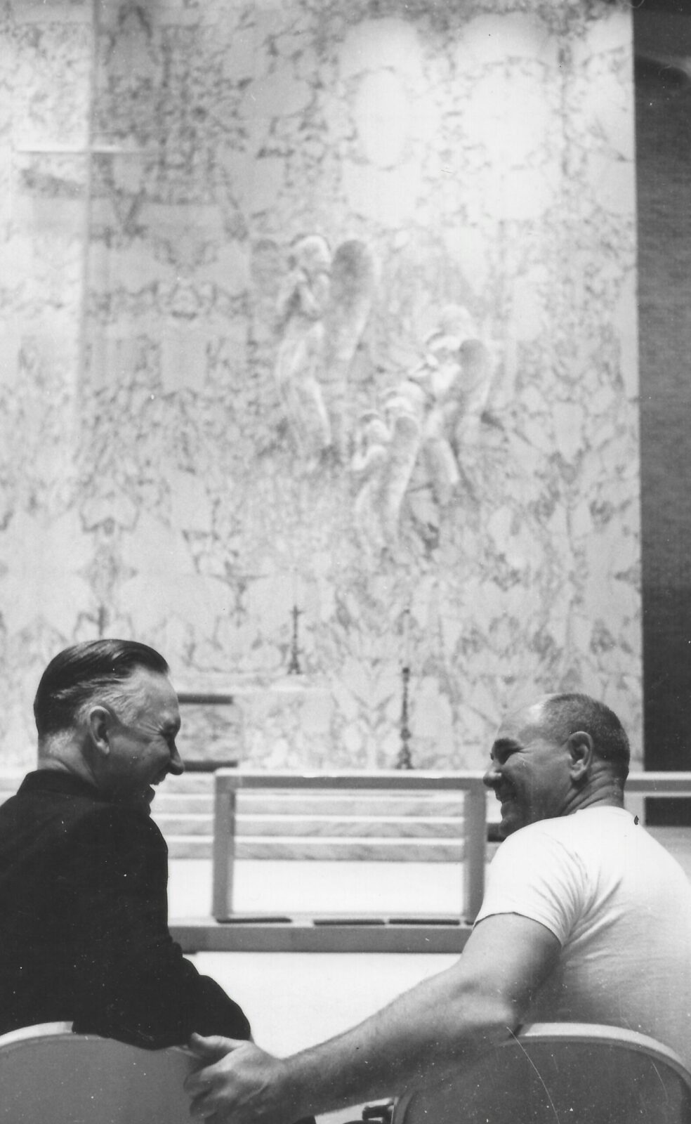 Umlauf-Fr-1 Saint Michael's former Rector, Father Taliaferro, speaks with The Archangels sculptor Charles Umlauf.